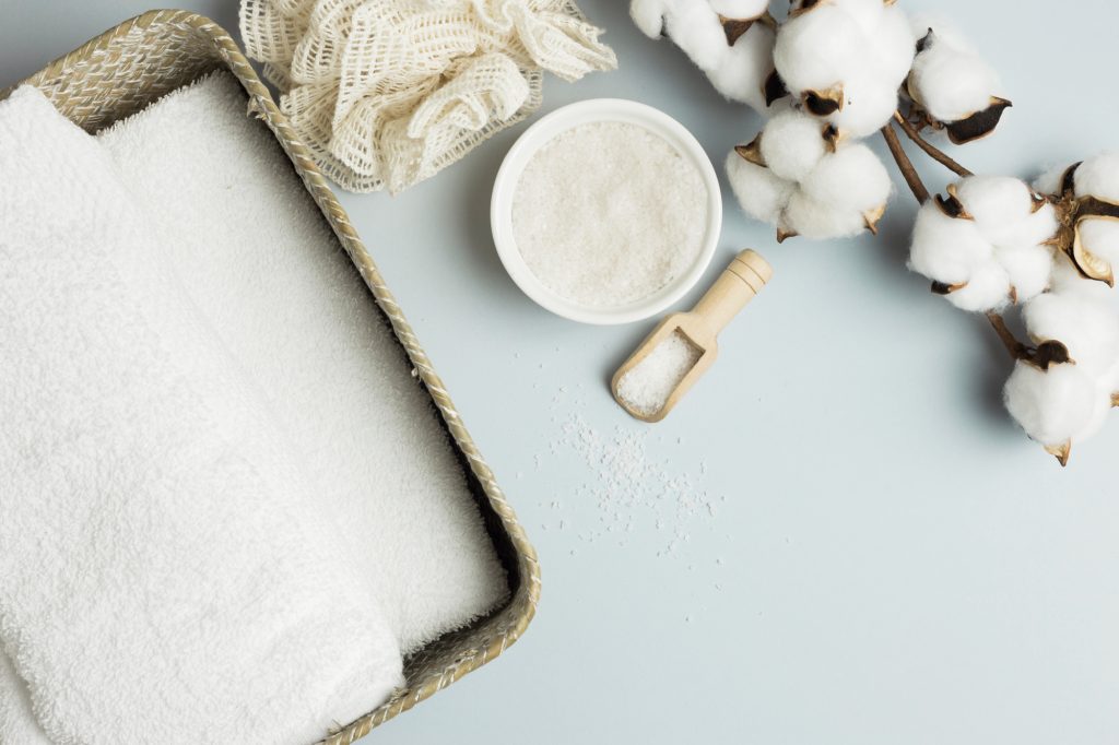 Faisalabad Massage Centre offering a soothing spa experience with soft white towels, natural bath salts, and cotton for ultimate relaxation.